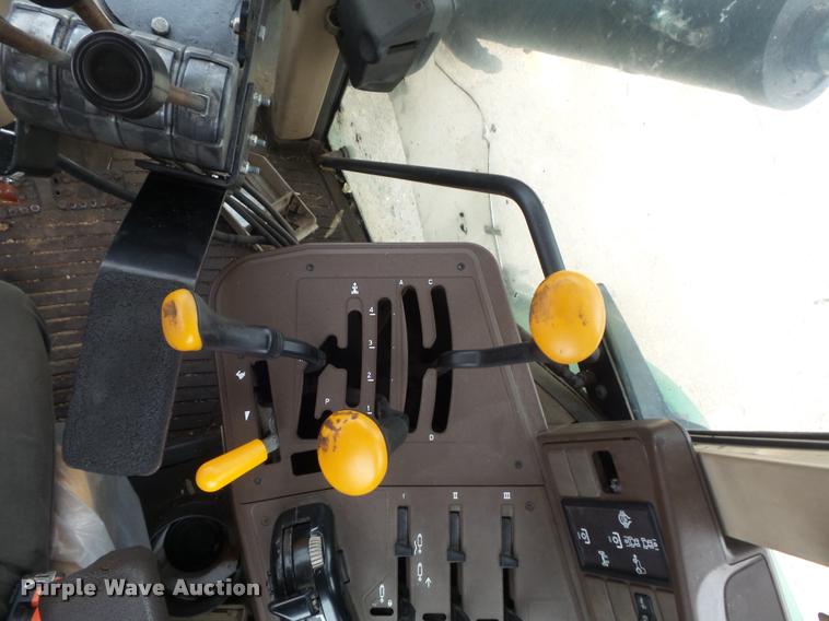 image for item K7637 1999 John Deere 6410 MFWD tractor