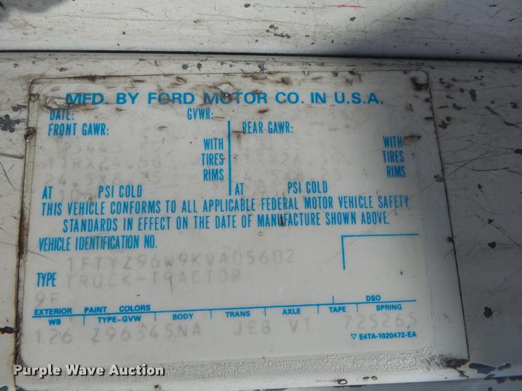 image for item DA2733 1989 Ford 900 semi truck