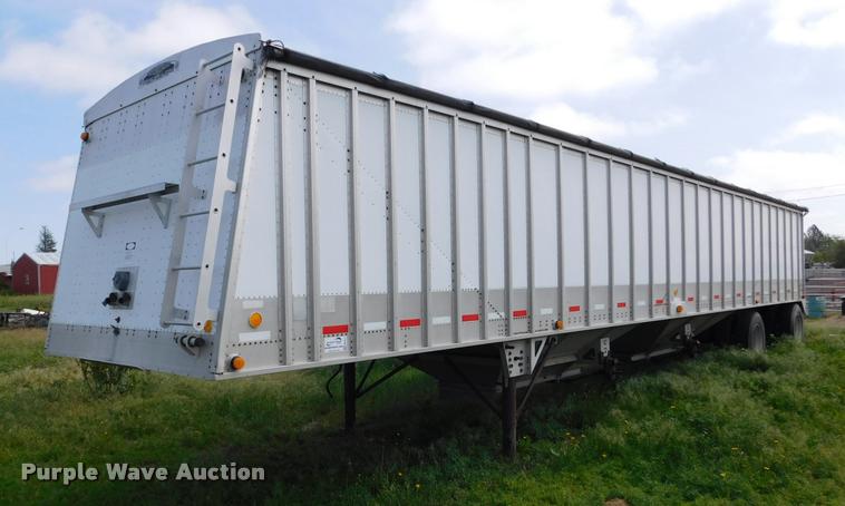 image for item DB1011 2000 Corn Husker triple hopper bottom grain trailer
