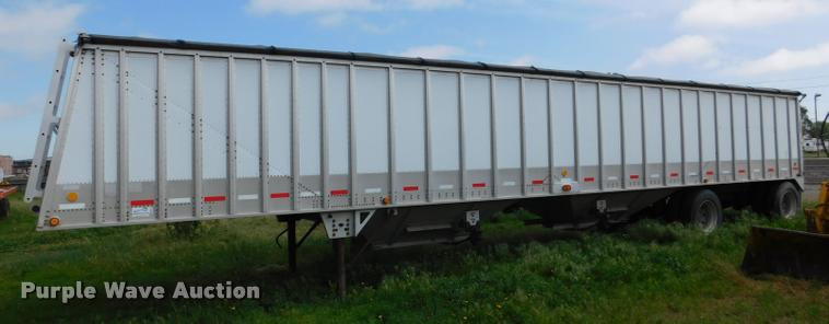 image for item DB1011 2000 Corn Husker triple hopper bottom grain trailer