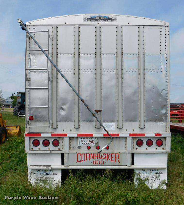 image for item DB1011 2000 Corn Husker triple hopper bottom grain trailer