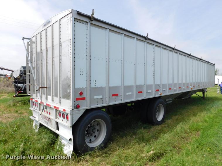 image for item DB1011 2000 Corn Husker triple hopper bottom grain trailer