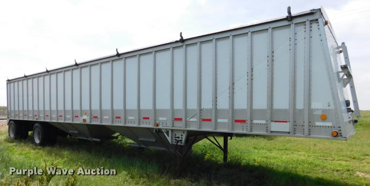 image for item DB1011 2000 Corn Husker triple hopper bottom grain trailer