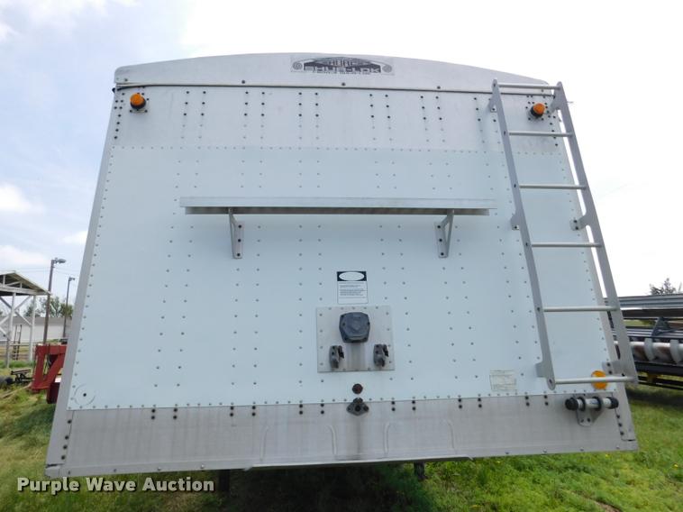 image for item DB1011 2000 Corn Husker triple hopper bottom grain trailer