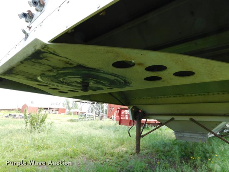 image for item DB1011 2000 Corn Husker triple hopper bottom grain trailer