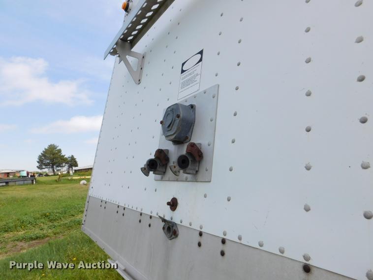 image for item DB1011 2000 Corn Husker triple hopper bottom grain trailer