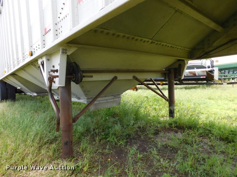 image for item DB1011 2000 Corn Husker triple hopper bottom grain trailer