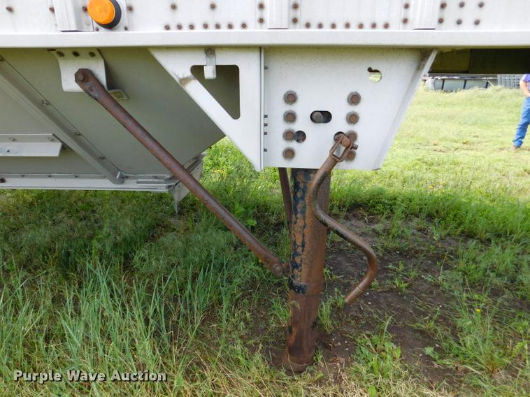 image for item DB1011 2000 Corn Husker triple hopper bottom grain trailer