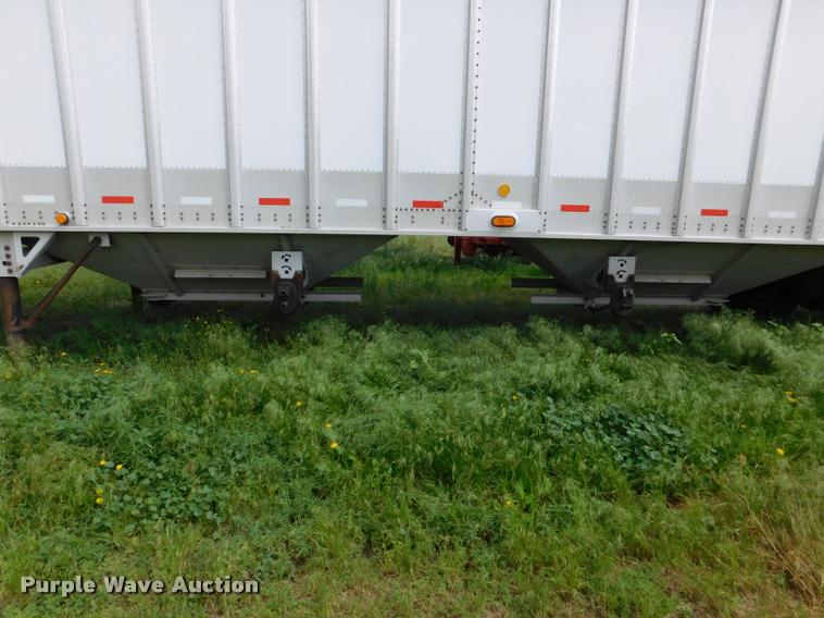 image for item DB1011 2000 Corn Husker triple hopper bottom grain trailer