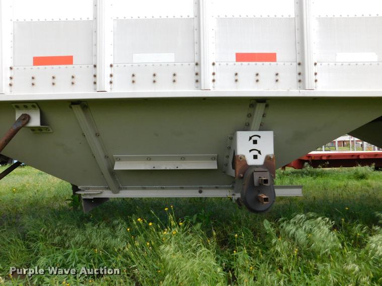 image for item DB1011 2000 Corn Husker triple hopper bottom grain trailer