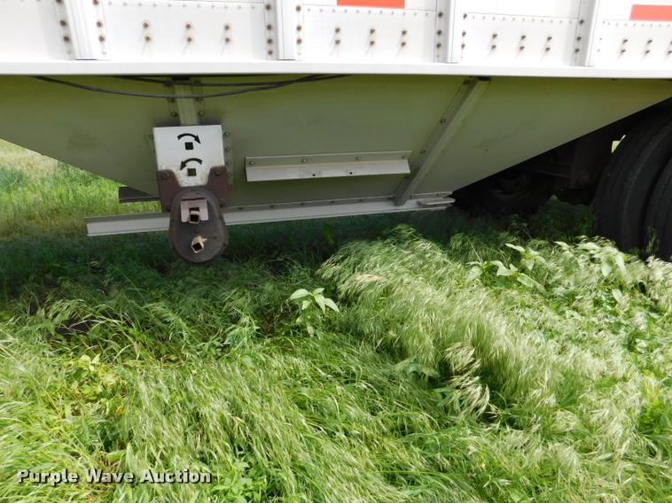 image for item DB1011 2000 Corn Husker triple hopper bottom grain trailer
