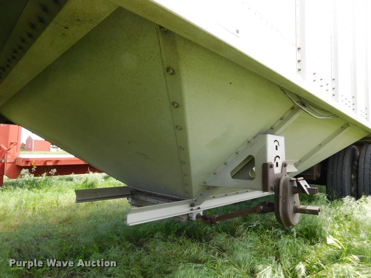 image for item DB1011 2000 Corn Husker triple hopper bottom grain trailer