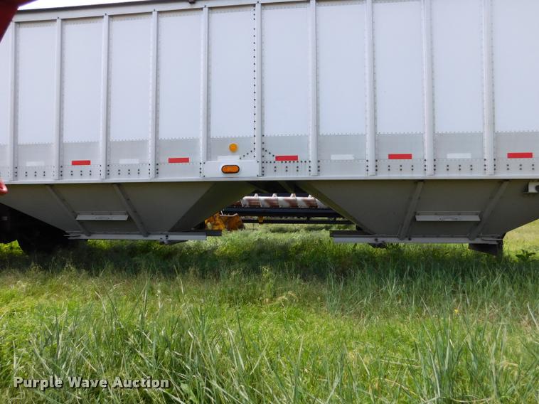 image for item DB1011 2000 Corn Husker triple hopper bottom grain trailer