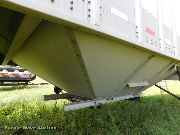 image for item DB1011 2000 Corn Husker triple hopper bottom grain trailer