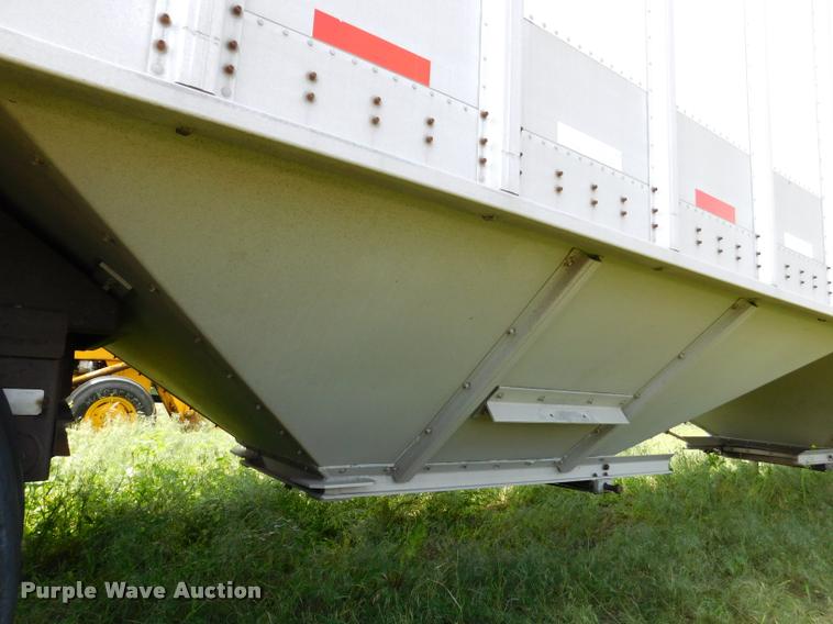 image for item DB1011 2000 Corn Husker triple hopper bottom grain trailer