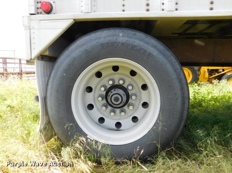 image for item DB1011 2000 Corn Husker triple hopper bottom grain trailer