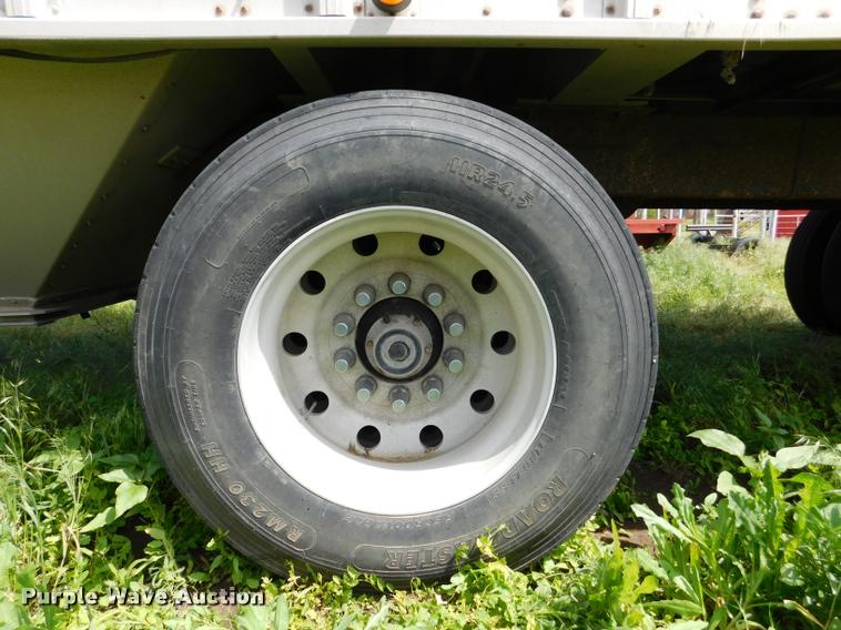 image for item DB1011 2000 Corn Husker triple hopper bottom grain trailer