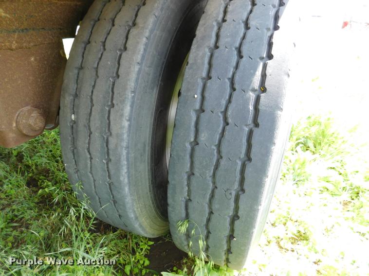 image for item DB1011 2000 Corn Husker triple hopper bottom grain trailer