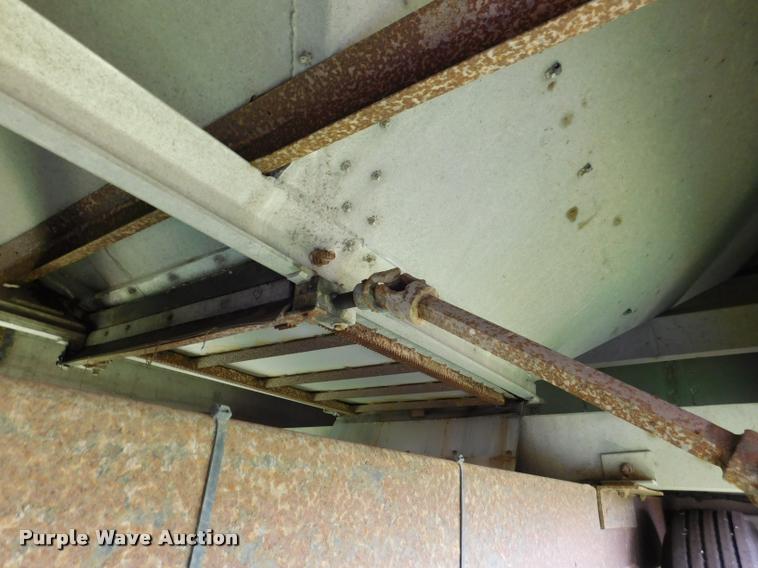 image for item DB1011 2000 Corn Husker triple hopper bottom grain trailer