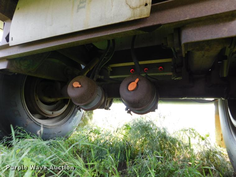 image for item DB1011 2000 Corn Husker triple hopper bottom grain trailer