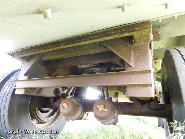 image for item DB1011 2000 Corn Husker triple hopper bottom grain trailer