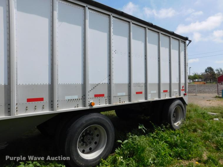 image for item DB1011 2000 Corn Husker triple hopper bottom grain trailer