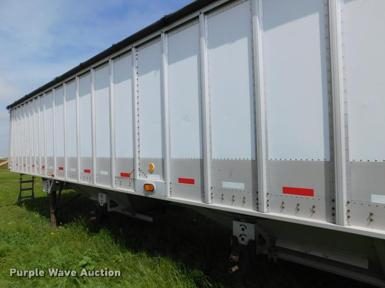 image for item DB1011 2000 Corn Husker triple hopper bottom grain trailer