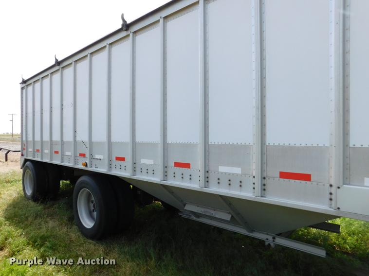 image for item DB1011 2000 Corn Husker triple hopper bottom grain trailer