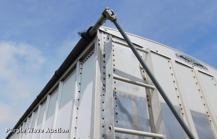 image for item DB1011 2000 Corn Husker triple hopper bottom grain trailer