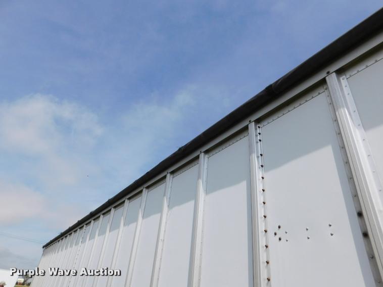 image for item DB1011 2000 Corn Husker triple hopper bottom grain trailer