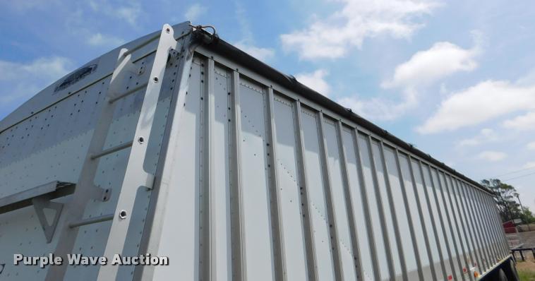 image for item DB1011 2000 Corn Husker triple hopper bottom grain trailer