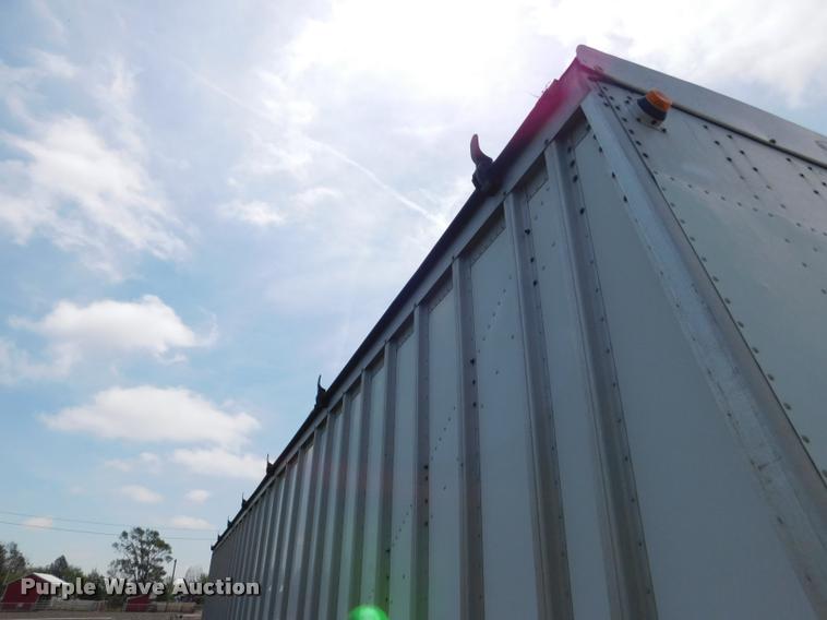 image for item DB1011 2000 Corn Husker triple hopper bottom grain trailer