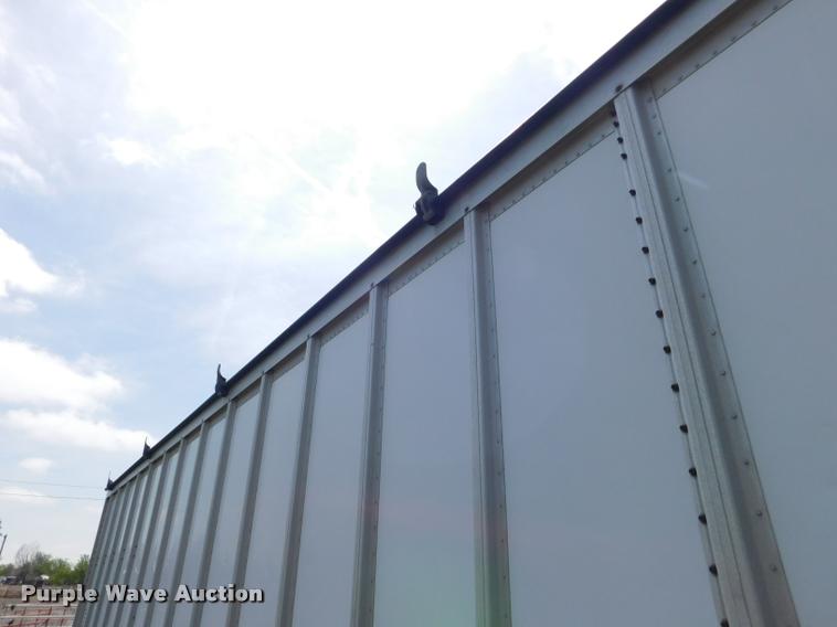 image for item DB1011 2000 Corn Husker triple hopper bottom grain trailer