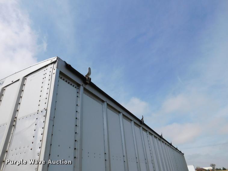 image for item DB1011 2000 Corn Husker triple hopper bottom grain trailer