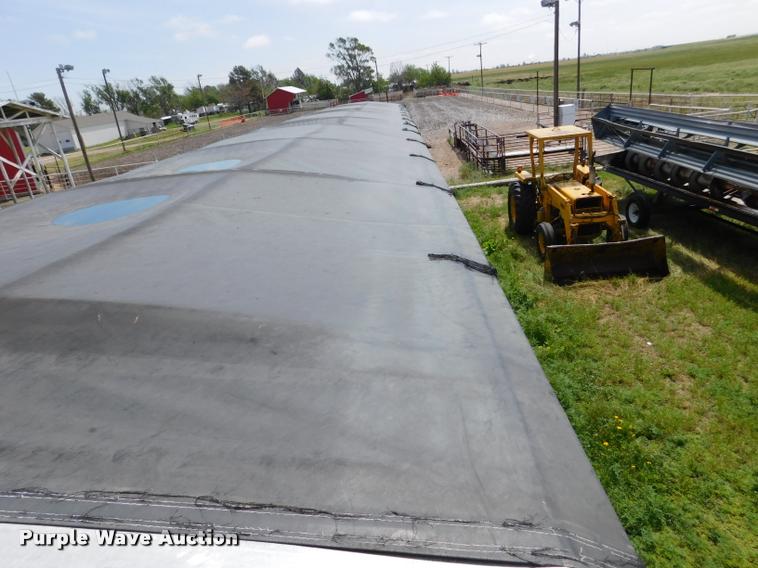 image for item DB1011 2000 Corn Husker triple hopper bottom grain trailer