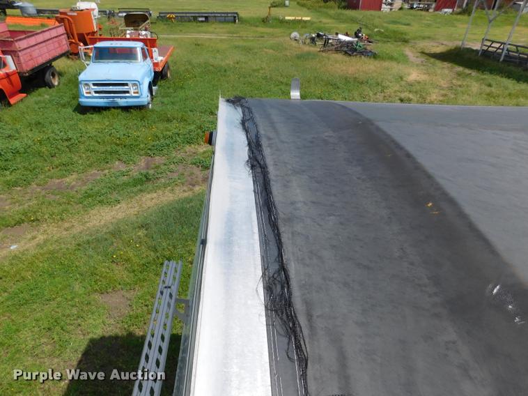 image for item DB1011 2000 Corn Husker triple hopper bottom grain trailer