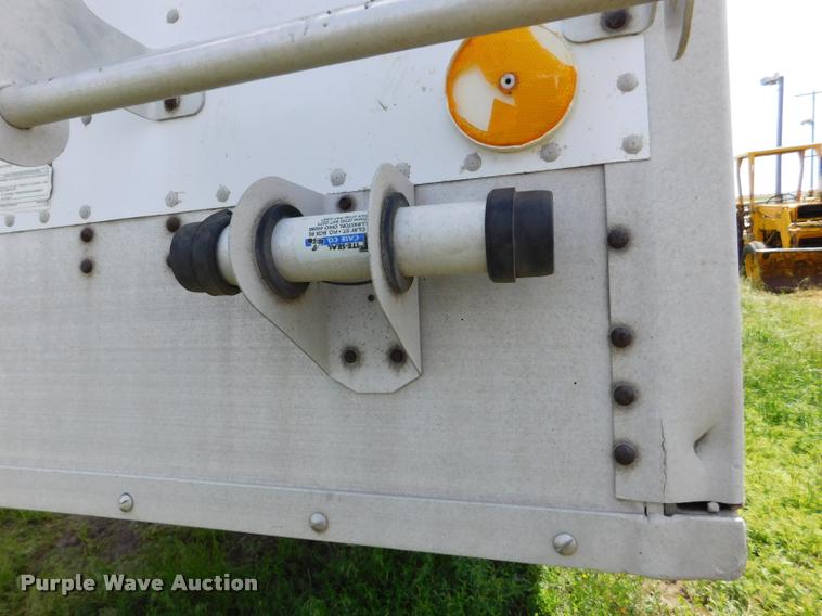 image for item DB1011 2000 Corn Husker triple hopper bottom grain trailer