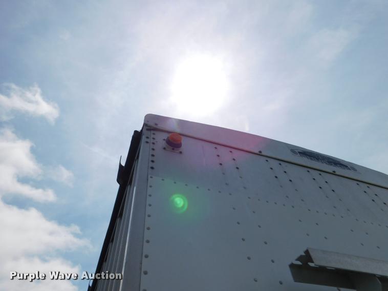 image for item DB1011 2000 Corn Husker triple hopper bottom grain trailer