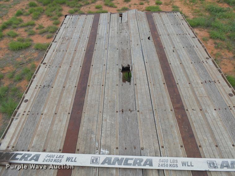 image for item DB2587 1995 Fontaine LFTW-5 flatbed trailer
