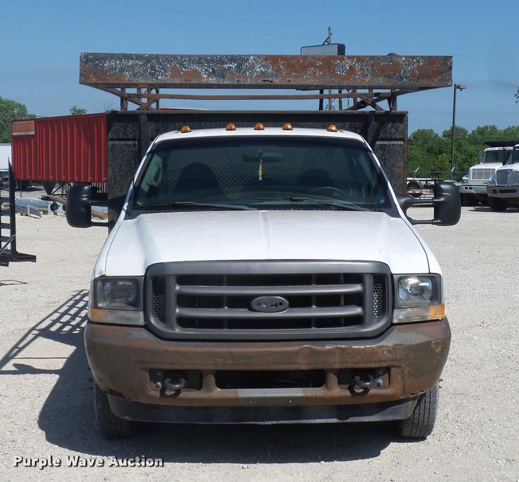 image for item DJ9535 2002 Ford F350 Super Duty flatbed pickup truck