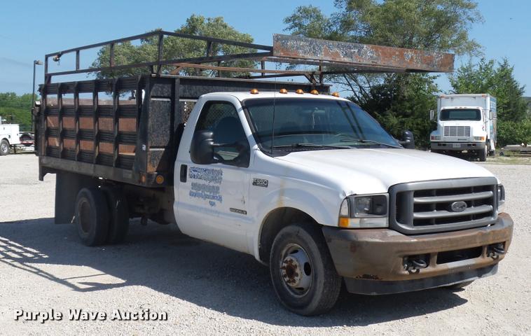 image for item DJ9535 2002 Ford F350 Super Duty flatbed pickup truck