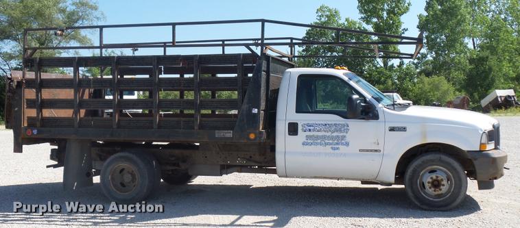 image for item DJ9535 2002 Ford F350 Super Duty flatbed pickup truck