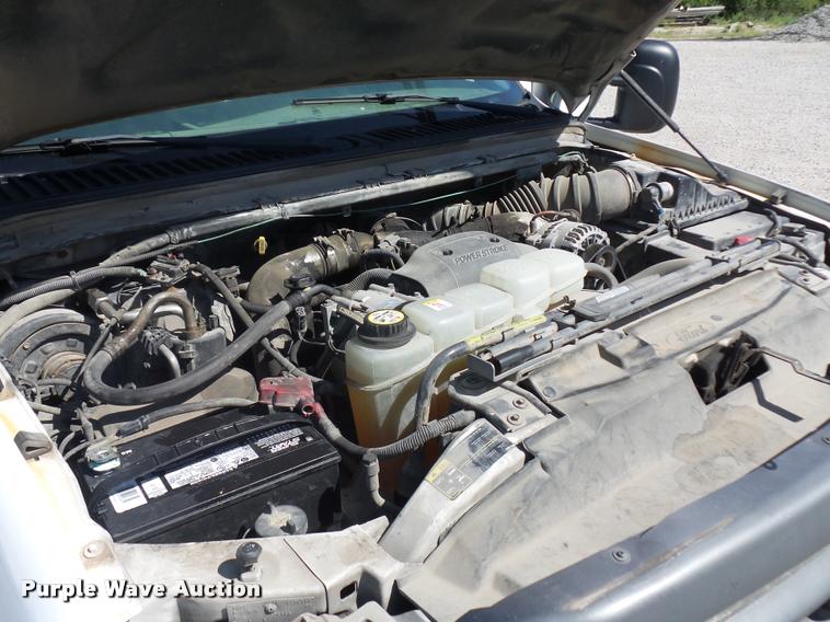 image for item DJ9535 2002 Ford F350 Super Duty flatbed pickup truck