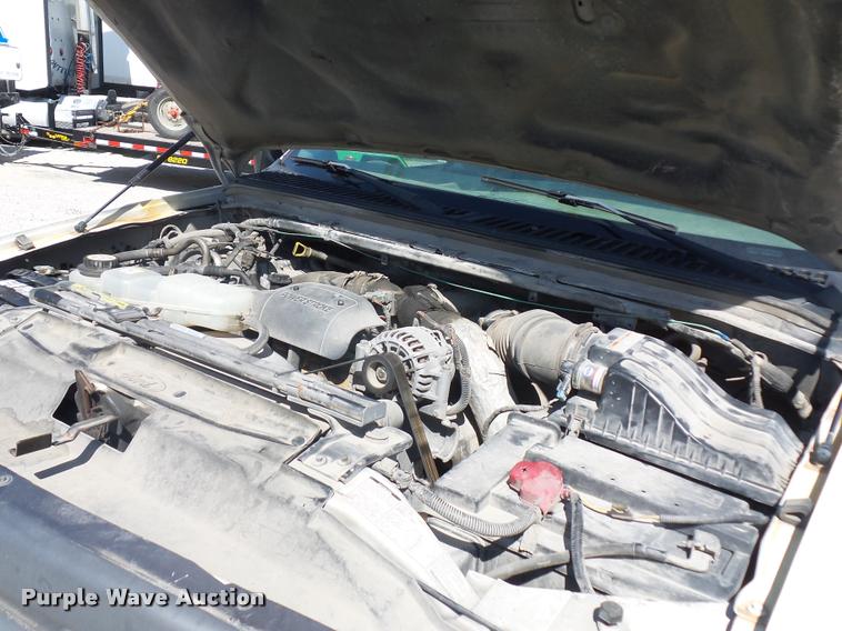 image for item DJ9535 2002 Ford F350 Super Duty flatbed pickup truck