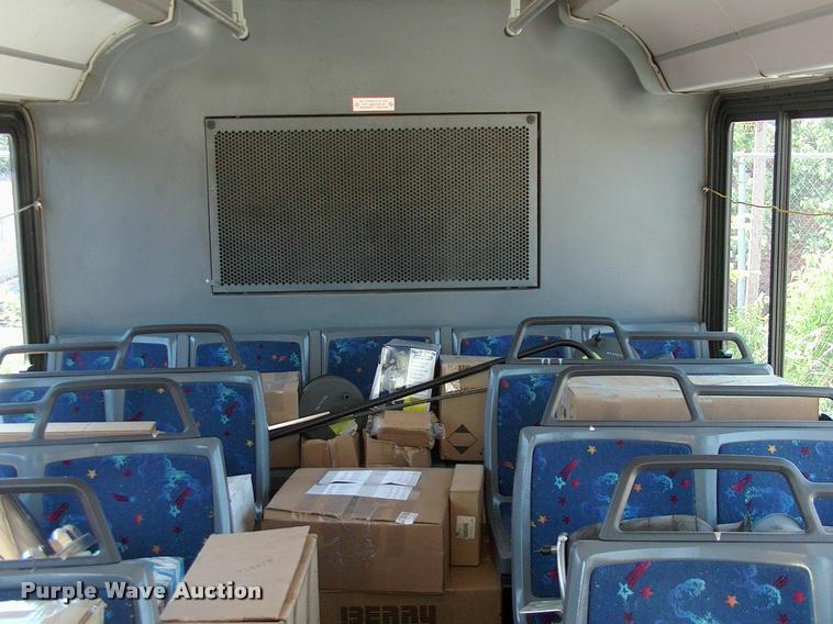 image for item DP9285 2003 Blue Bird shuttle bus