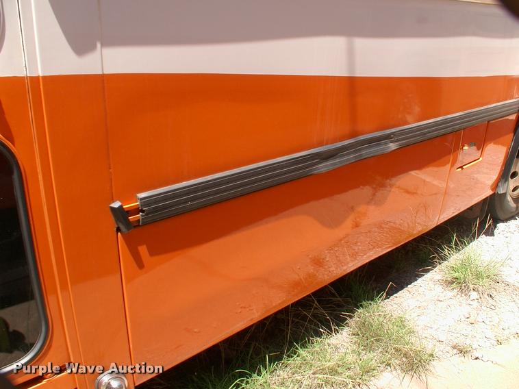 image for item DP9288 2003 Blue Bird shuttle bus