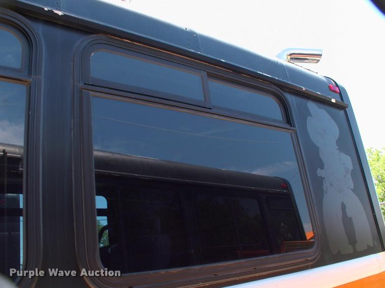 image for item DP9290 2003 Blue Bird shuttle bus