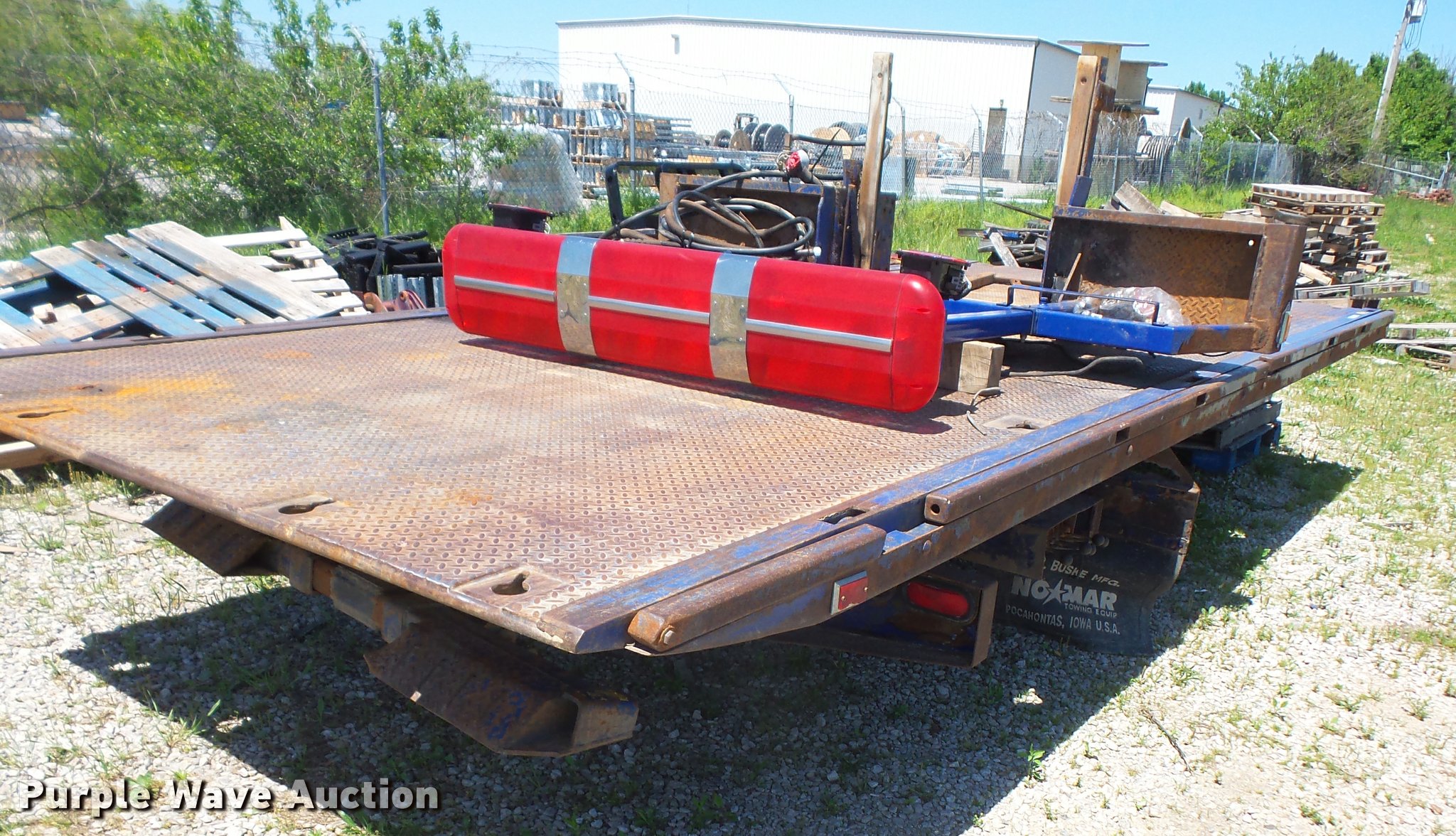 Nomar rollback bed in Olathe, KS Item BF9115 sold Purple Wave