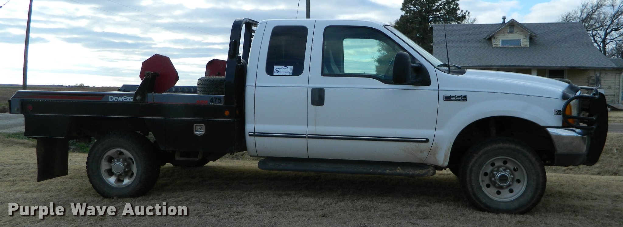1999 Ford F350 Super Duty SuperCab bale bed pickup truck