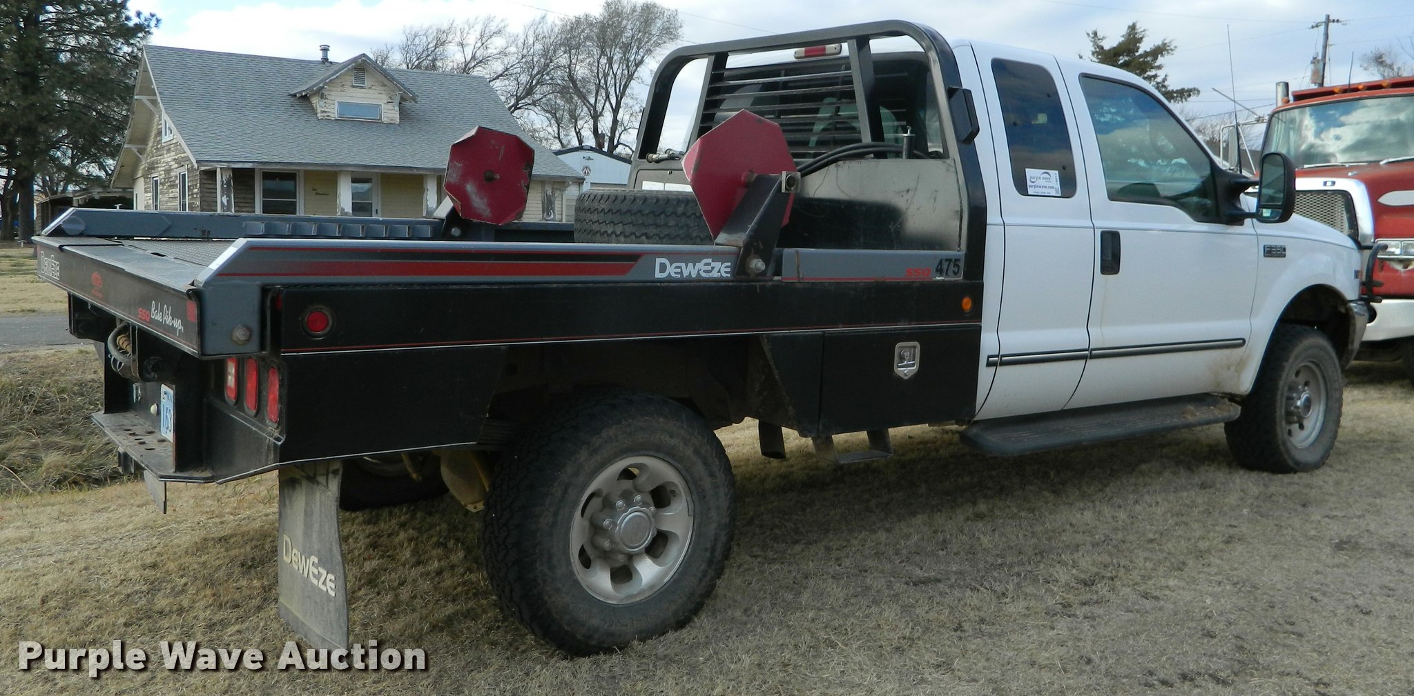 1999 Ford F350 Super Duty SuperCab bale bed pickup truck